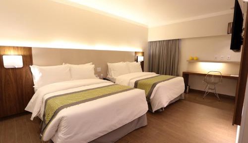 Quarto deluxe com 2 camas de casal