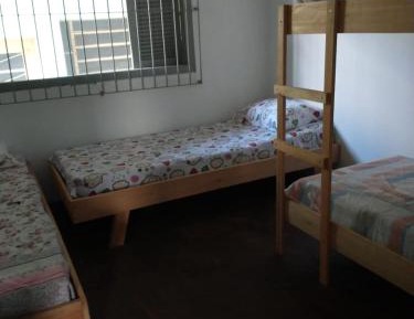Single Bed in Dormitory Room