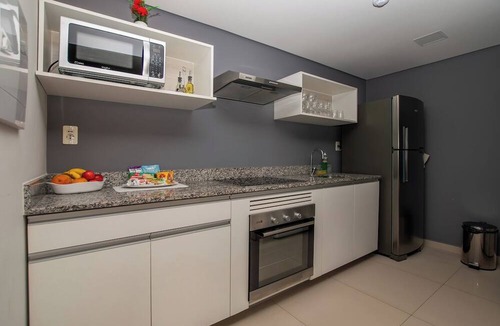 Luque Apartment | Business Living, Pool & Workspace, Malls Nearby