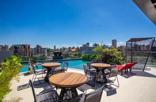 Bigorrilho Apartment | Batel Studio Rooftop Pool, Jacuzzi & Gym