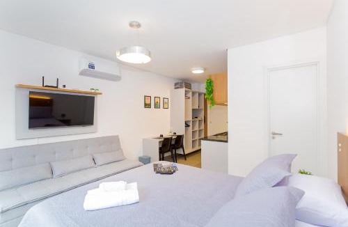 Cristo Rei Apartment | Apartamento 101 - Eixo · Studio c/Garden Privativo e Cozinha Completa