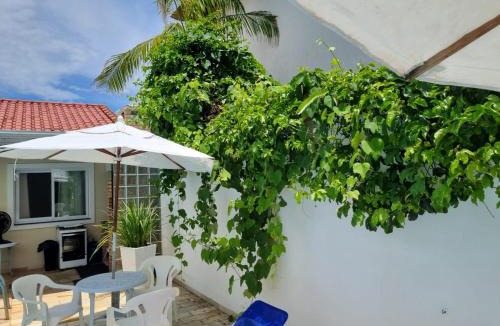 Itanhaem House | Casa com Piscina Privativa Gigante e Escorregador Pertinho da Praia com Bikes para Passeio
