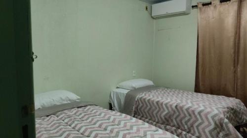 Foz do Iguacu Villa | Casa Amarela Superhost 3 quartos 2Wc 1Suite piscina a 20min das Cataratas ar split e piscina 9 pax