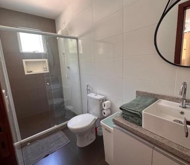Guaratiba House | Casa com quadra de areia