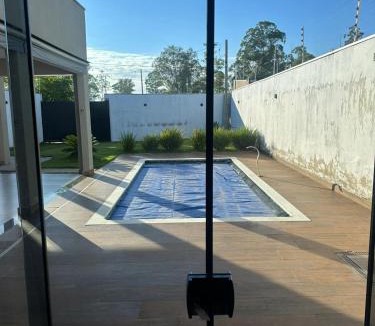 Americana House | Moderna área com Wi-Fi e ar condicionado