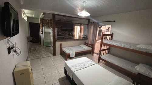 Balneario Praia do Leste Hotel | Recanto Pousada JU&JU com piscina COMPARTILHADA