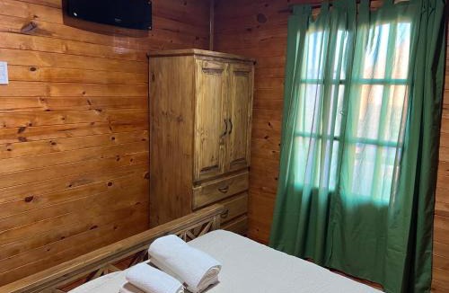 Larroque Hotel | Complejo de cabañas El Mangrullo