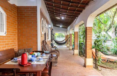 Guarau House | Casa rustica com Wi-Fi, garagem e aceita pet
