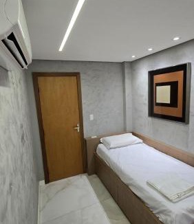 Castelo Apartment | 101 - Área Privativa de Luxo ar condicionado e churrasqueira
