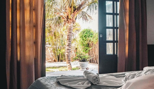 Family suit with two rooms and 4 beds near by the beach