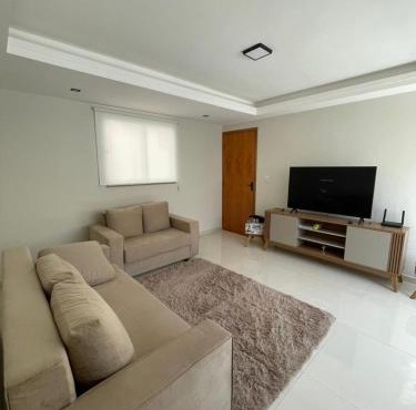 Apartamento em Poços - Varanda com Churrasqueira