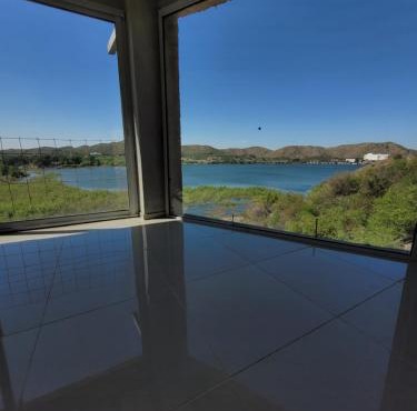 Punta El Tesoro - Playa Privada al Lago