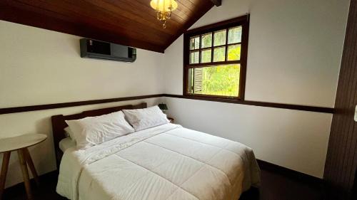 Casa 02 Vale Boa Vista - Casa em Condomínio Exclusivo com Vista para as Montanhas e Área de Lazer Completa