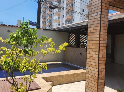 Sobrado Aviação piscina, churrasqueira, jacuzzi in Praia Grande