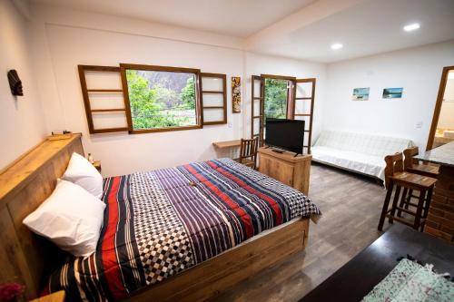 Casa Lucas - loft espaçoso com jardim e churrasqueira in Petrópolis