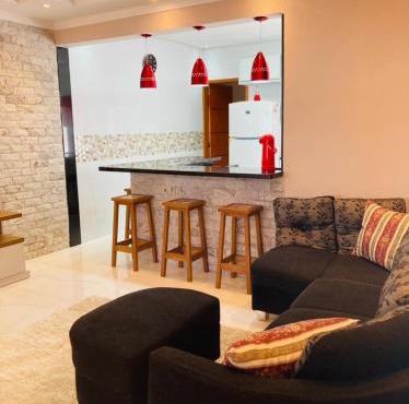 Casa Moderna e Aconchegante à Beira Mar, com Opção de Piscina Aquecida Cobrado à Parte, Área Gourmet com Churrasqueira em Deck Coberto Frente a Piscina, Aconchegante Sala de Estar com Lareira, Garagem para 4 Carros, Casa Pé na Areia a 50 metros da Praia